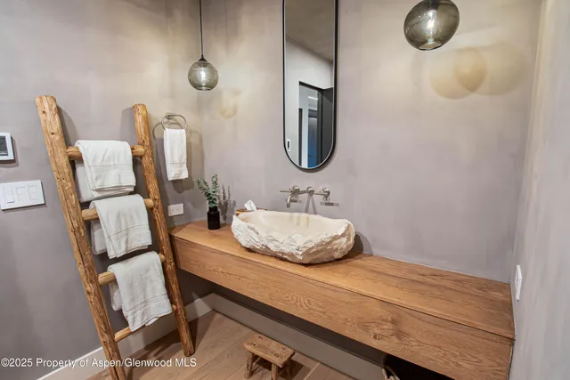 a bathroom with a tub and shower