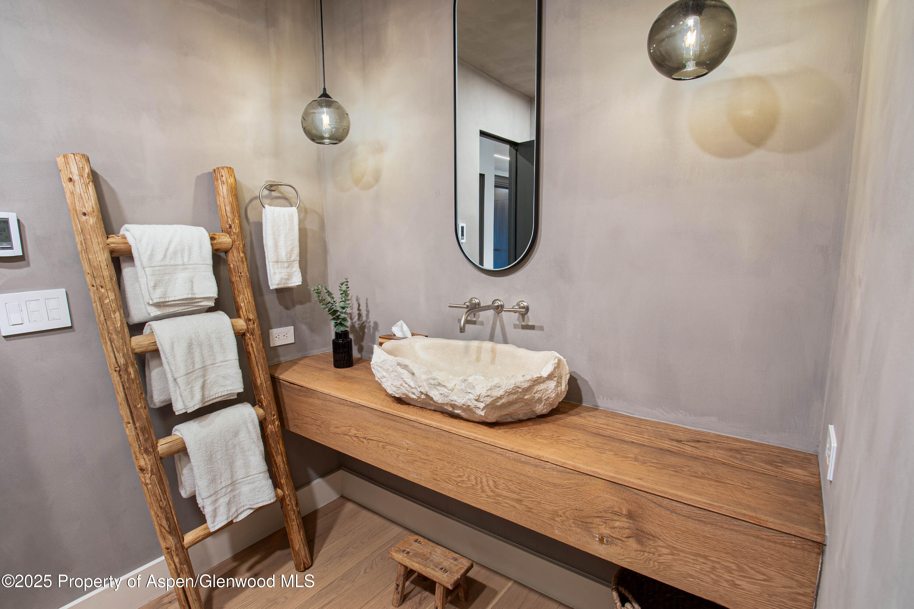 306 Edgewood Lane Snowmass Village, CO 81615 - Photo 34 of 41 a bathroom with a sink mirror and vanity