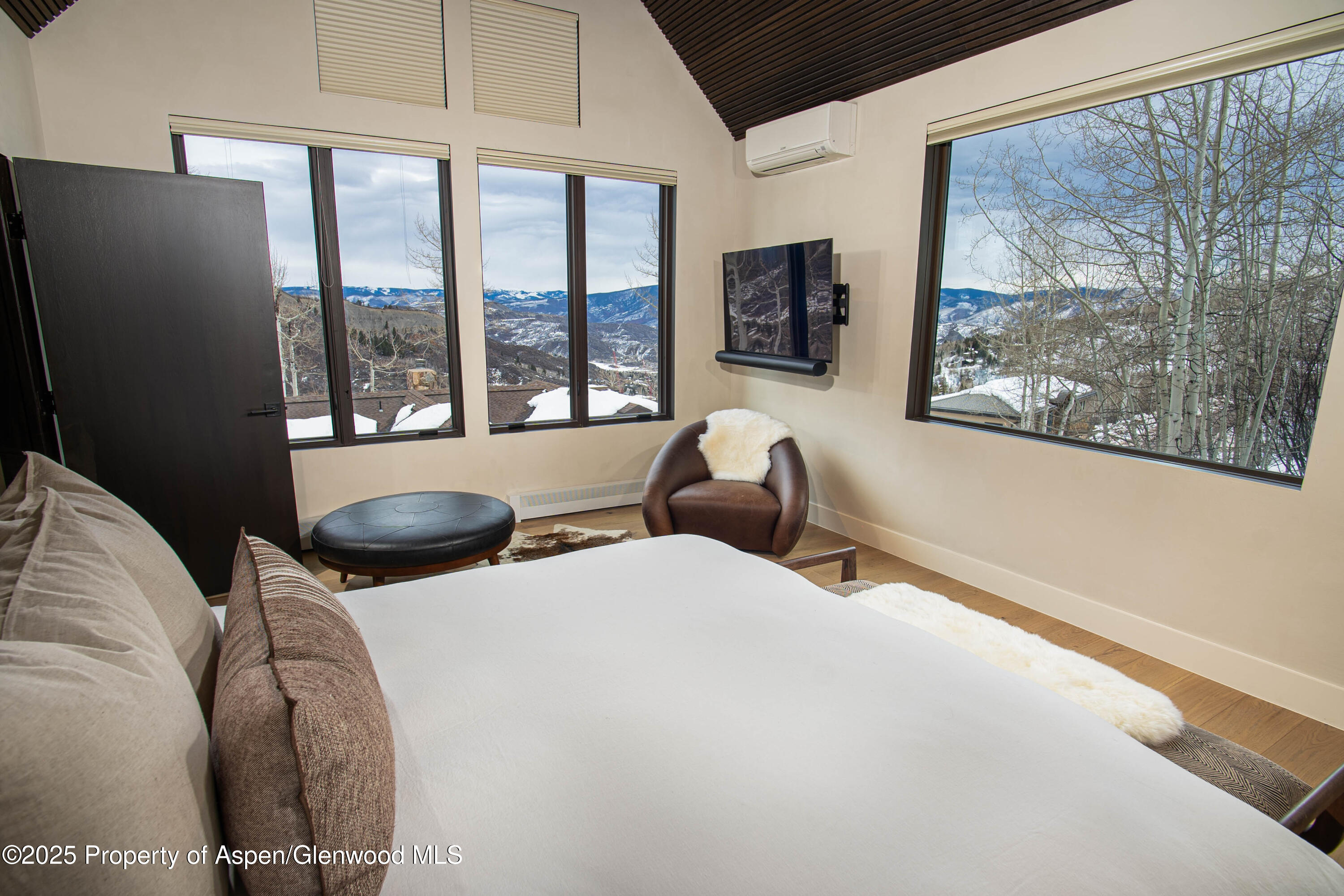 306 Edgewood Lane Snowmass Village, CO 81615 - Photo 36 of 41 a bedroom with furniture and a large window