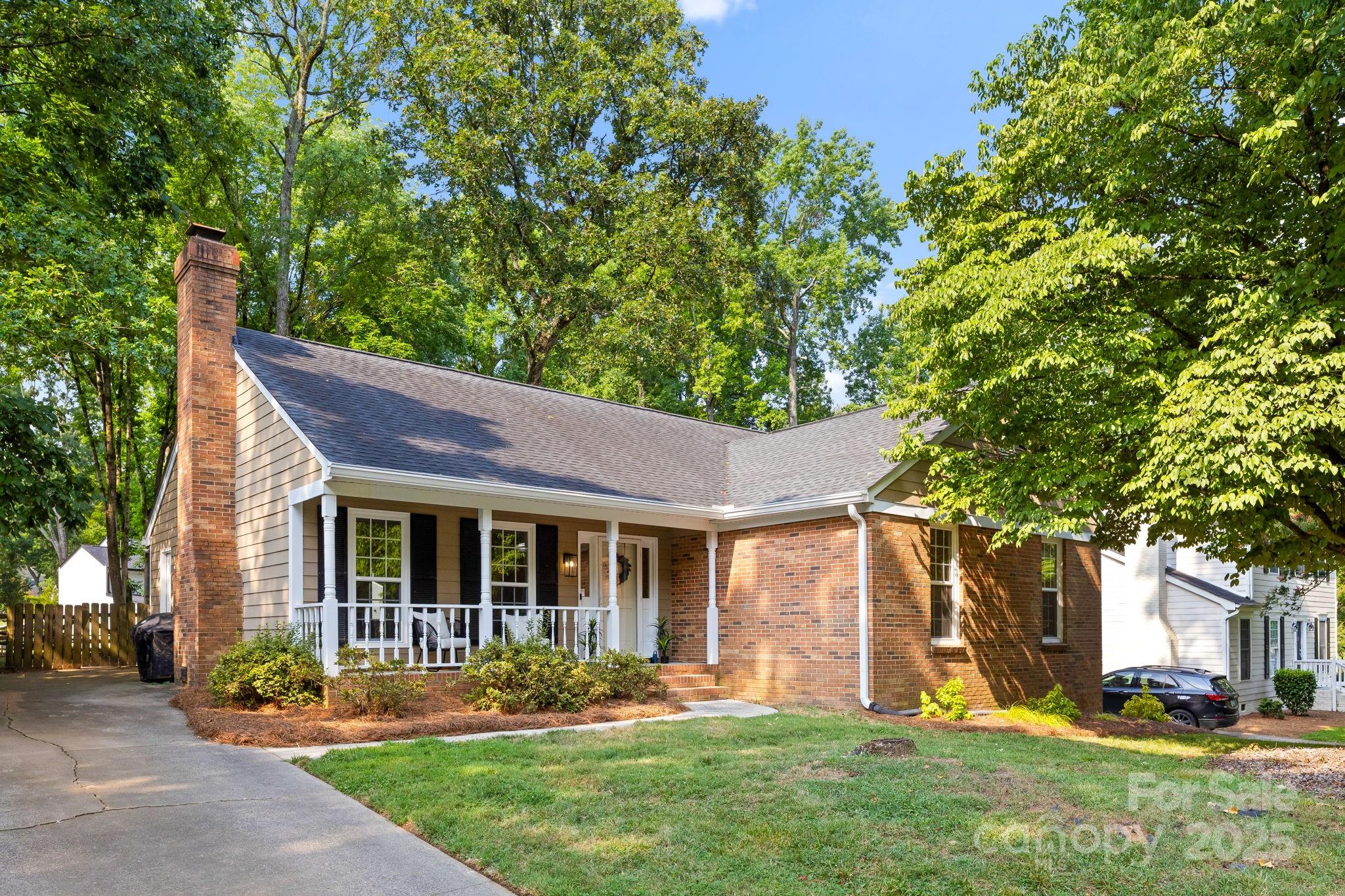 8806 Golf Ridge Drive Charlotte, NC 28277 - Photo 1 of 22 front view of a house with a yard