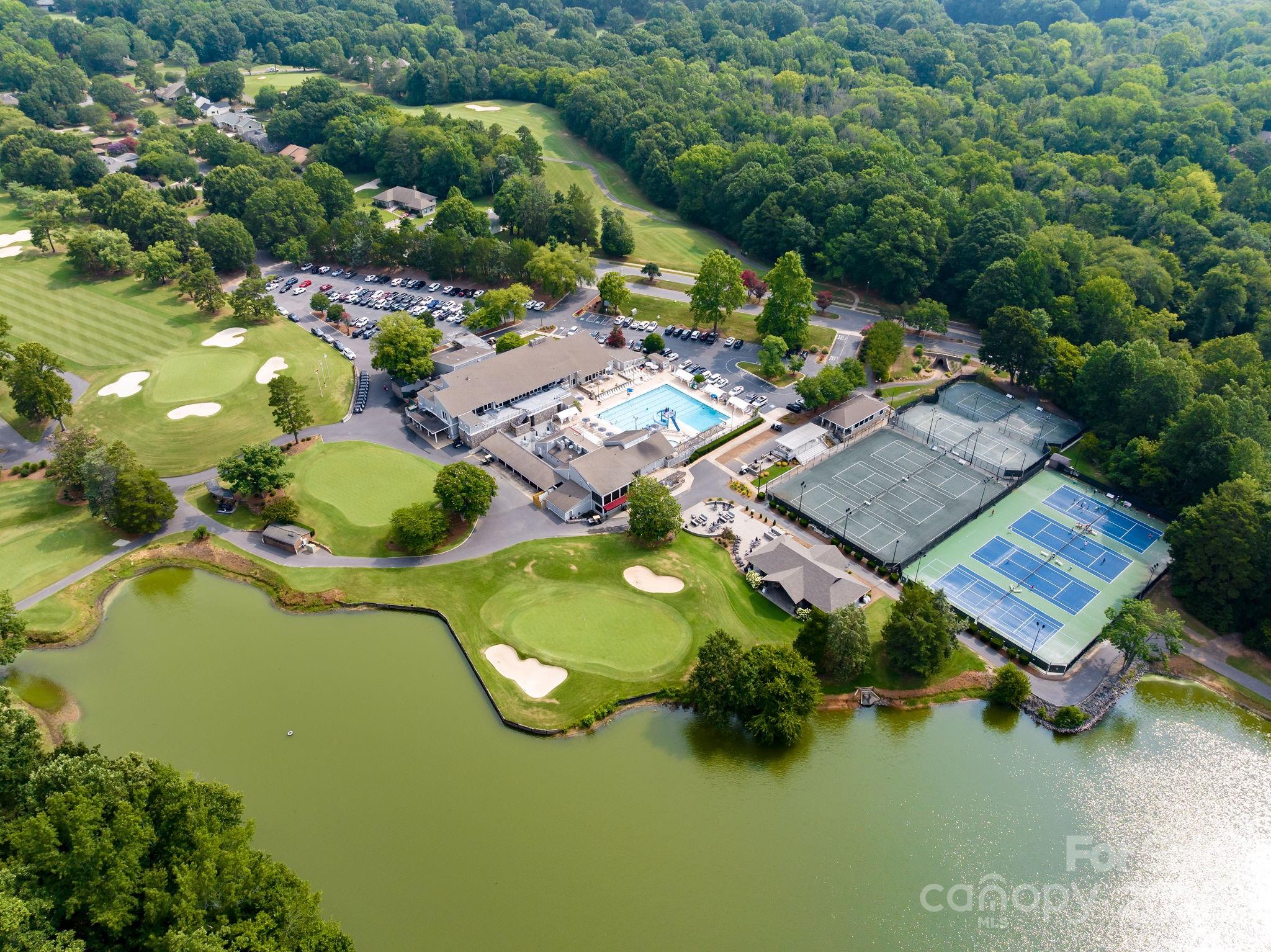 8806 Golf Ridge Drive Charlotte, NC 28277 - Photo 21 of 22 an aerial view of a house with swimming pool outdoor seating and yard