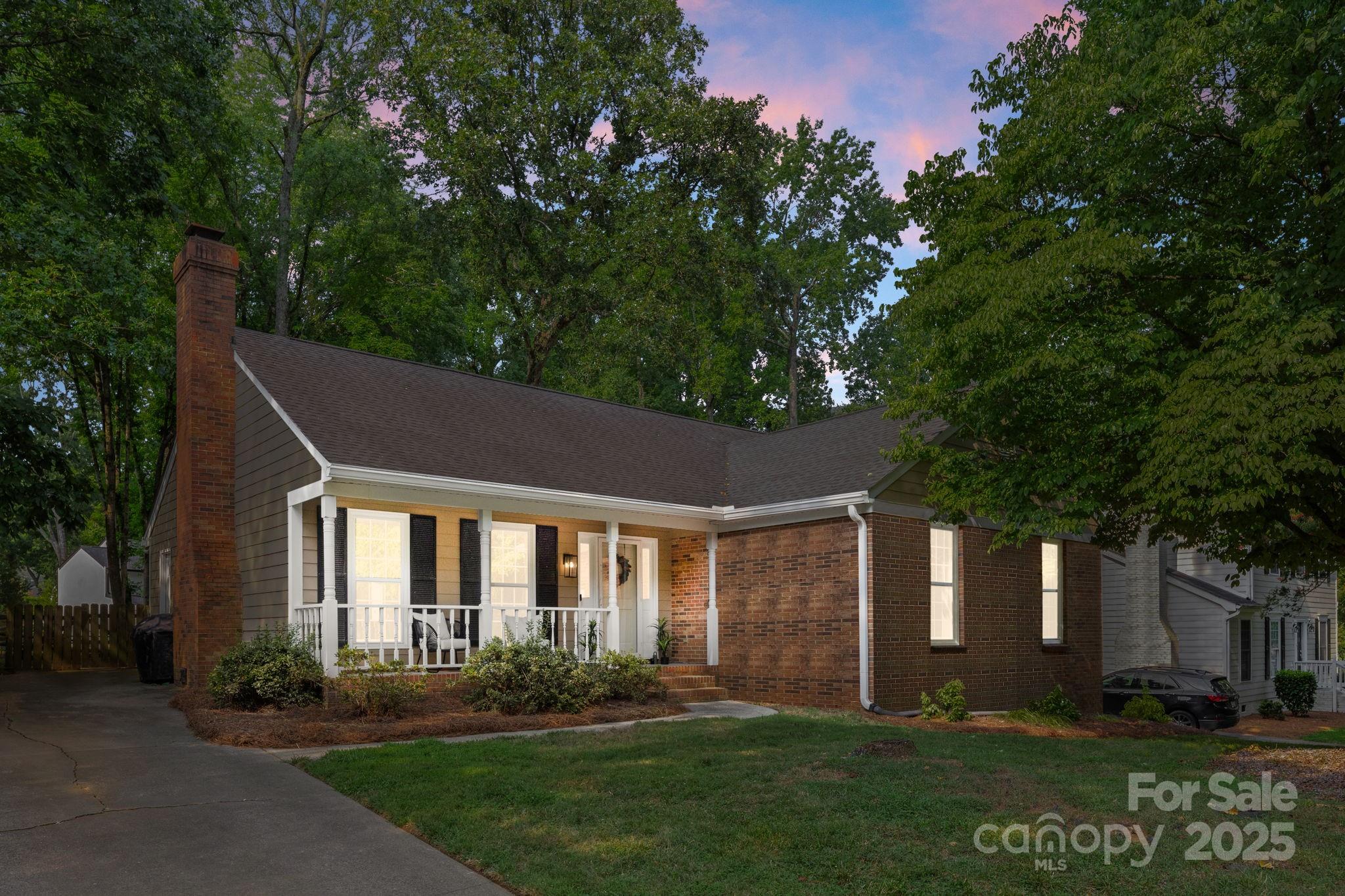 8806 Golf Ridge Drive Charlotte, NC 28277 - Photo 22 of 22 a front view of a house with a yard