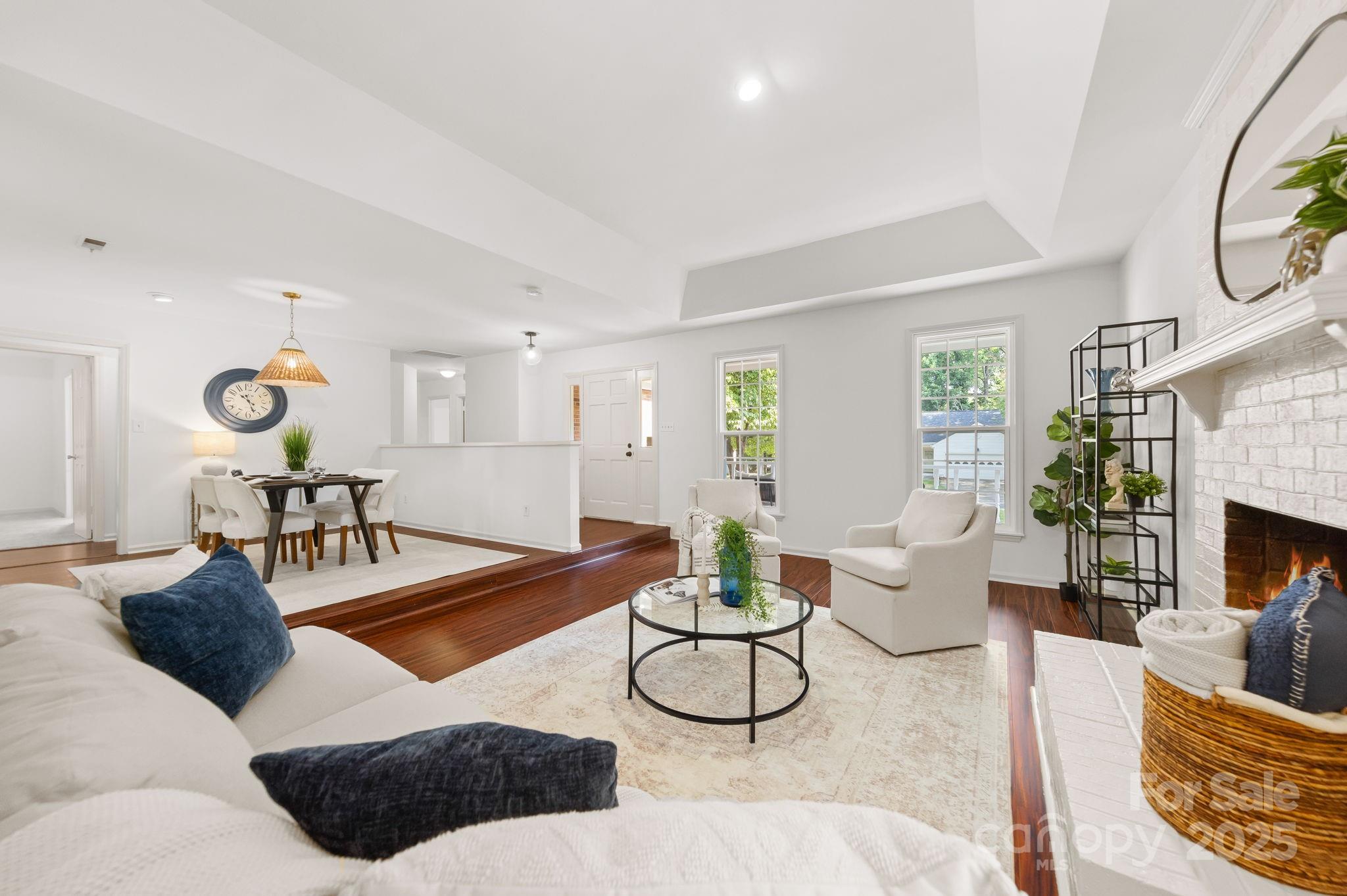 8806 Golf Ridge Drive Charlotte, NC 28277 - Photo 4 of 22 a living room with furniture and a fireplace