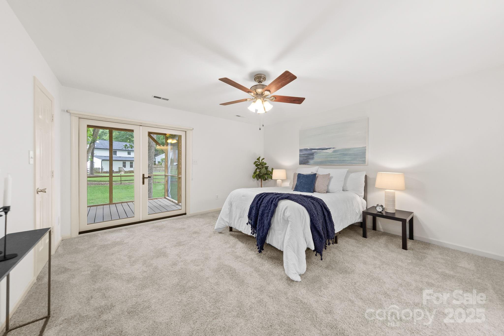 8806 Golf Ridge Drive Charlotte, NC 28277 - Photo 10 of 22 a spacious bedroom with a bed and a window