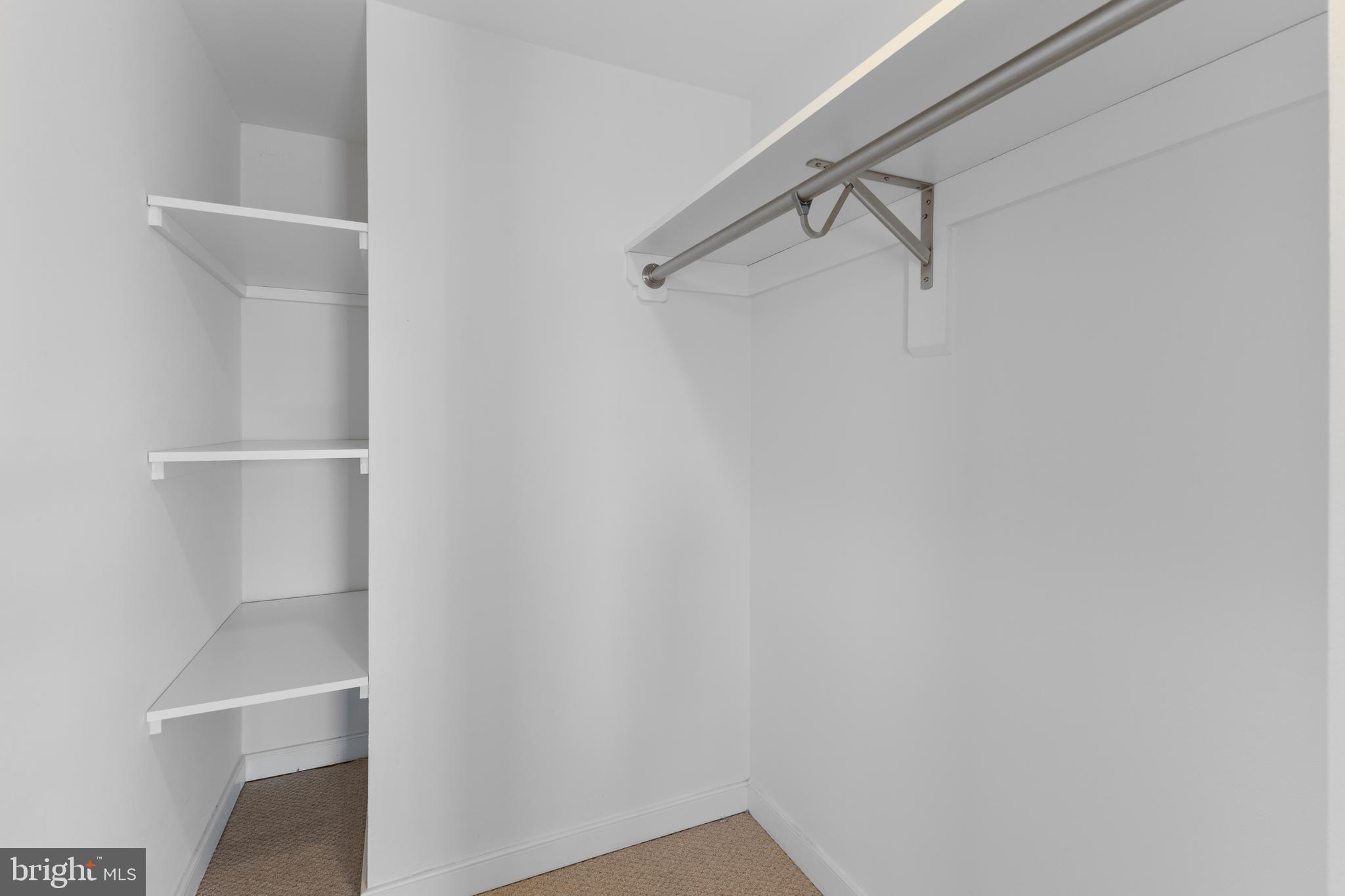 1099 22nd Street Northwest, Unit 807 Washington, DC 20037 - Photo 21 of 34 a view of an empty walk in closet
