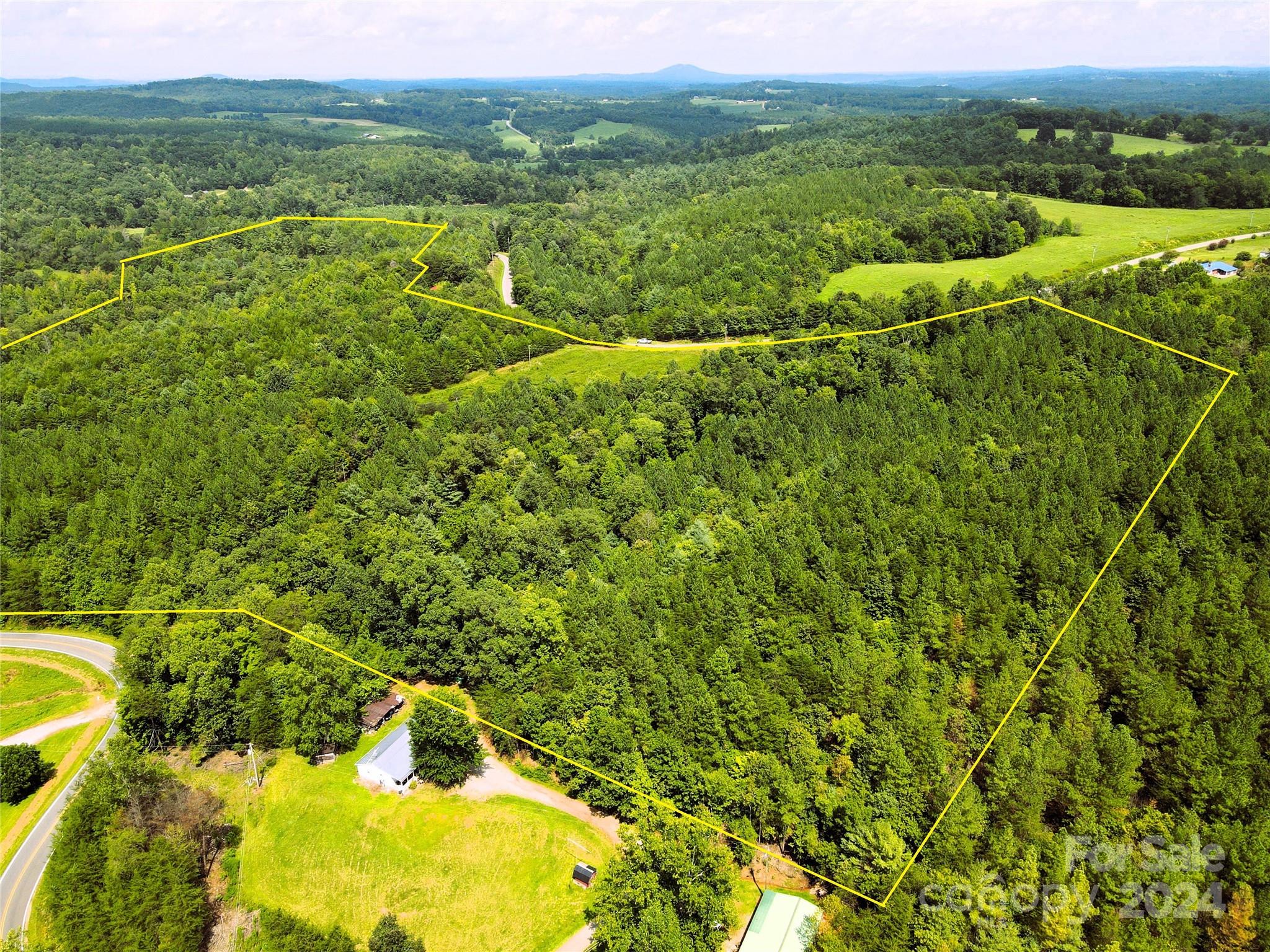 5157 Rhoney Road Connelly Springs, NC 28612 - Photo 11 of 29 a view of a field with an ocean