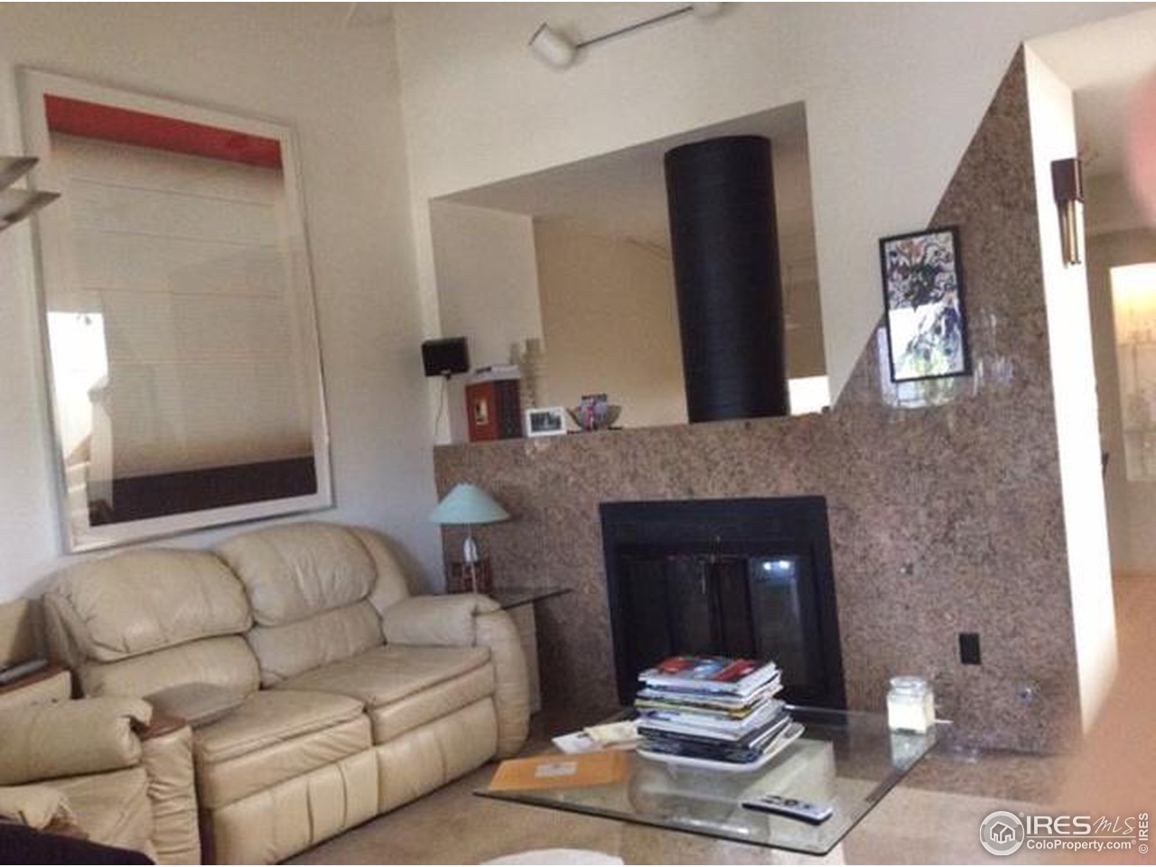 2728 Northbrook Place Boulder, CO 80304 - Photo 4 of 6 a living room with furniture and a fireplace