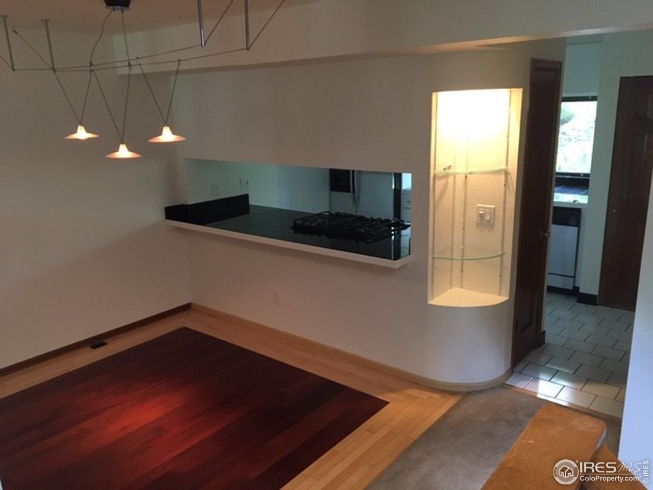 2728 Northbrook Place Boulder, CO 80304 - Photo 5 of 6 a view of a livingroom with wooden floor