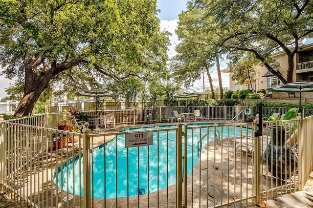 a view of a houses with a backyard