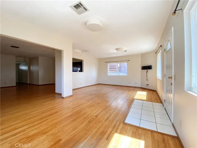 a view of an empty room and window