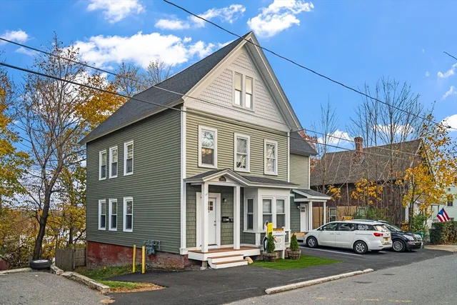 a view of a car park in front of a building