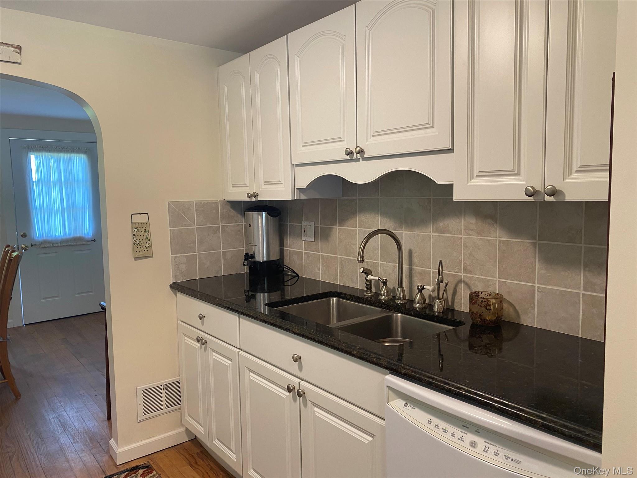 13 Fisher Road Cochecton, NY 12726 - Photo 12 of 32 a kitchen with granite countertop white cabinets and sink