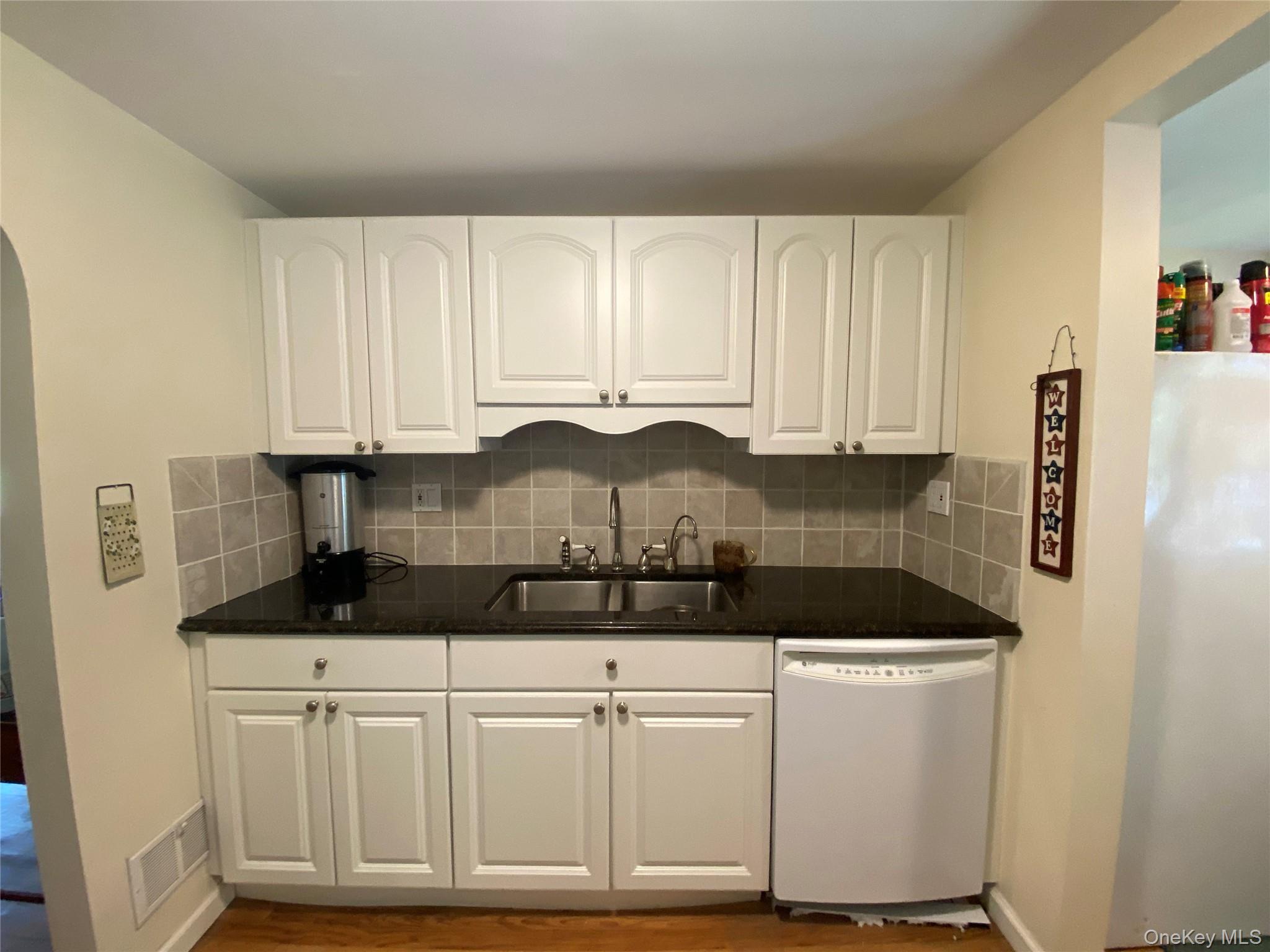 13 Fisher Road Cochecton, NY 12726 - Photo 13 of 32 a kitchen with granite countertop a sink and cabinets