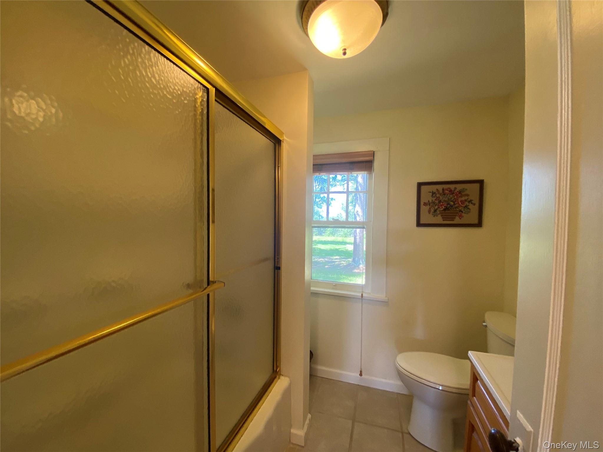 13 Fisher Road Cochecton, NY 12726 - Photo 22 of 32 a bathroom with a toilet and a shower