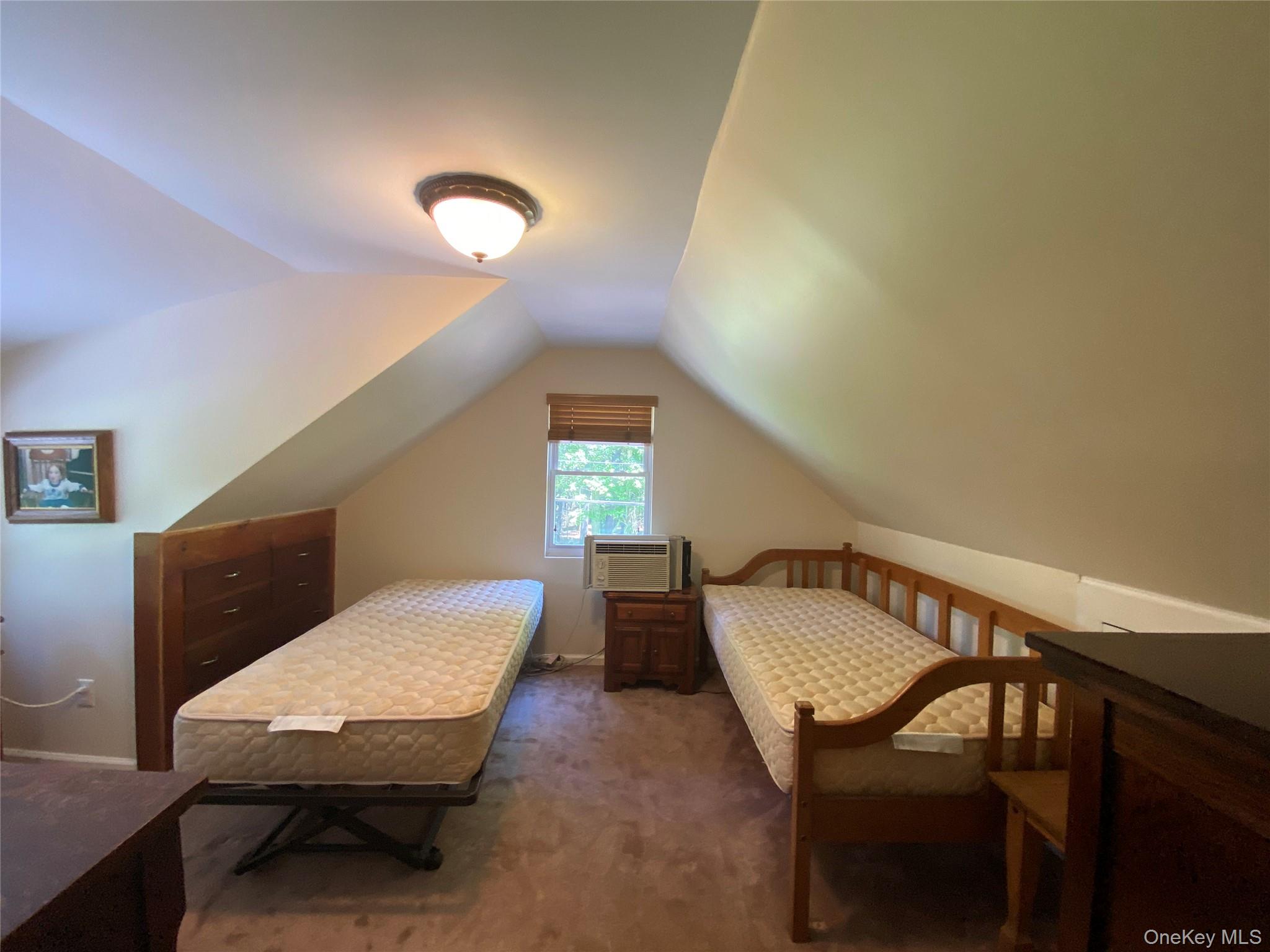 13 Fisher Road Cochecton, NY 12726 - Photo 25 of 32 a room with furniture and a window