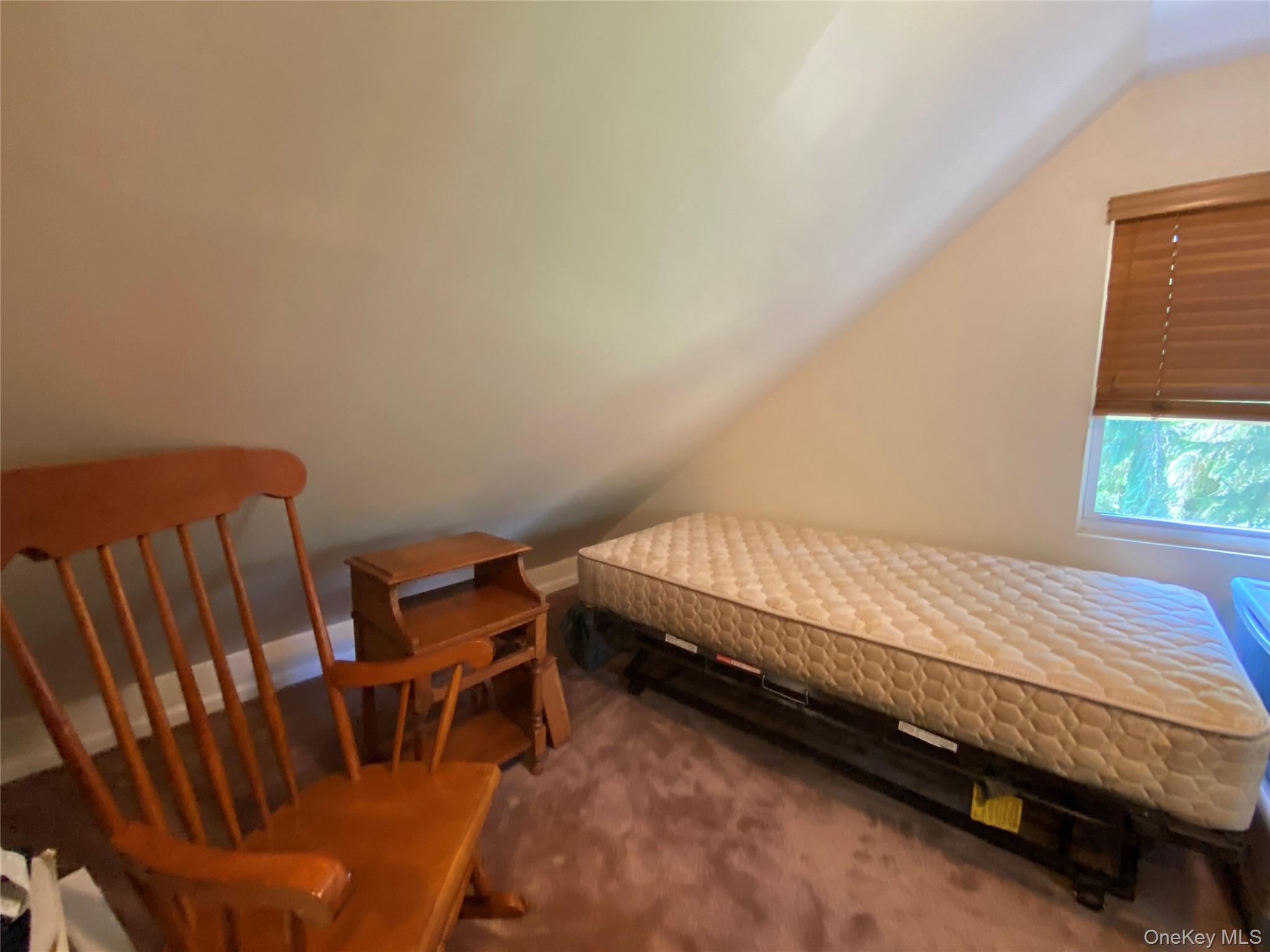 13 Fisher Road Cochecton, NY 12726 - Photo 29 of 32 a bedroom with furniture and a window