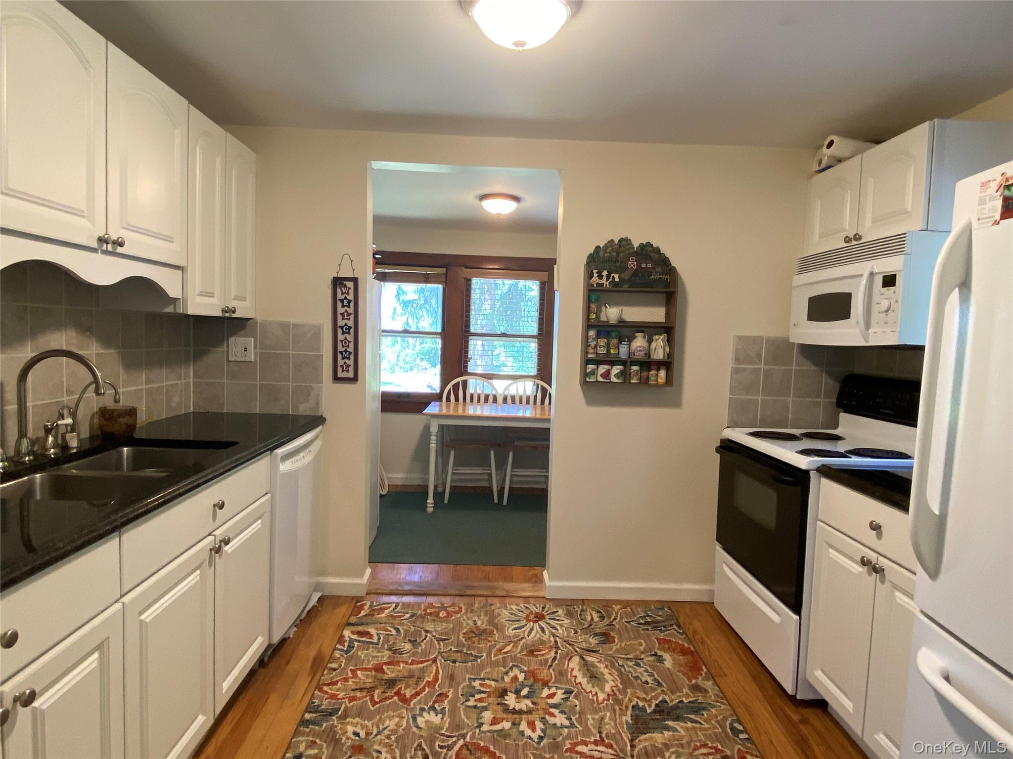 13 Fisher Road Cochecton, NY 12726 - Photo 8 of 32 a kitchen with stainless steel appliances granite countertop a refrigerator and a stove
