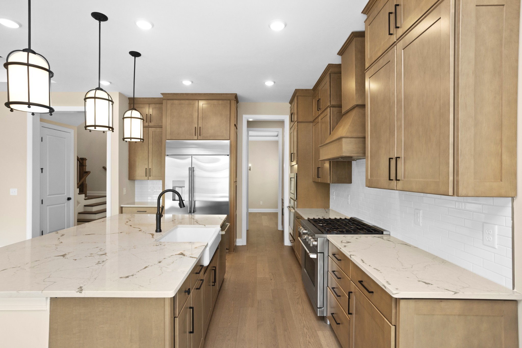 7004 Thunderhead Way Spring Hill, TN 37174 - Photo 22 of 52 a kitchen with a sink stove and refrigerator