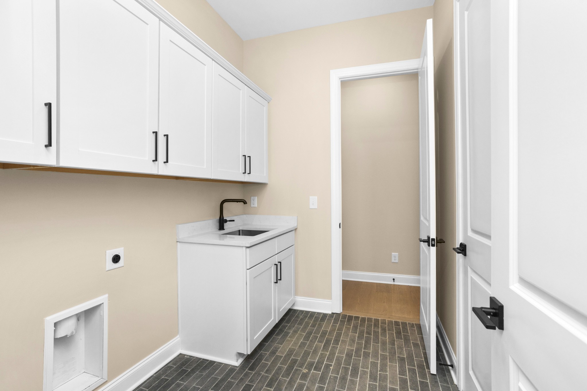 7004 Thunderhead Way Spring Hill, TN 37174 - Photo 24 of 52 a kitchen with a sink and cabinets