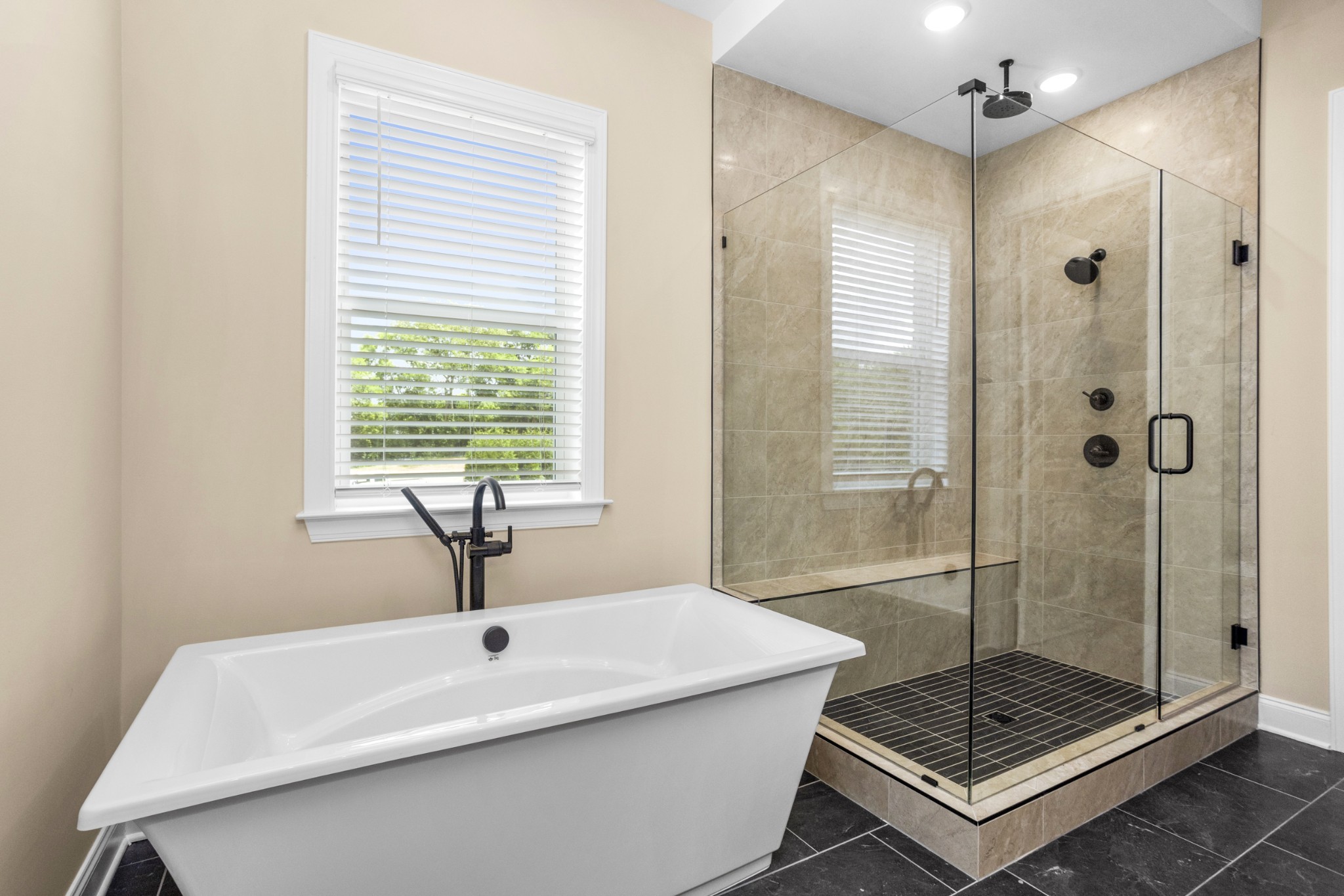 7004 Thunderhead Way Spring Hill, TN 37174 - Photo 28 of 52 a bathroom with a sink a shower and a mirror
