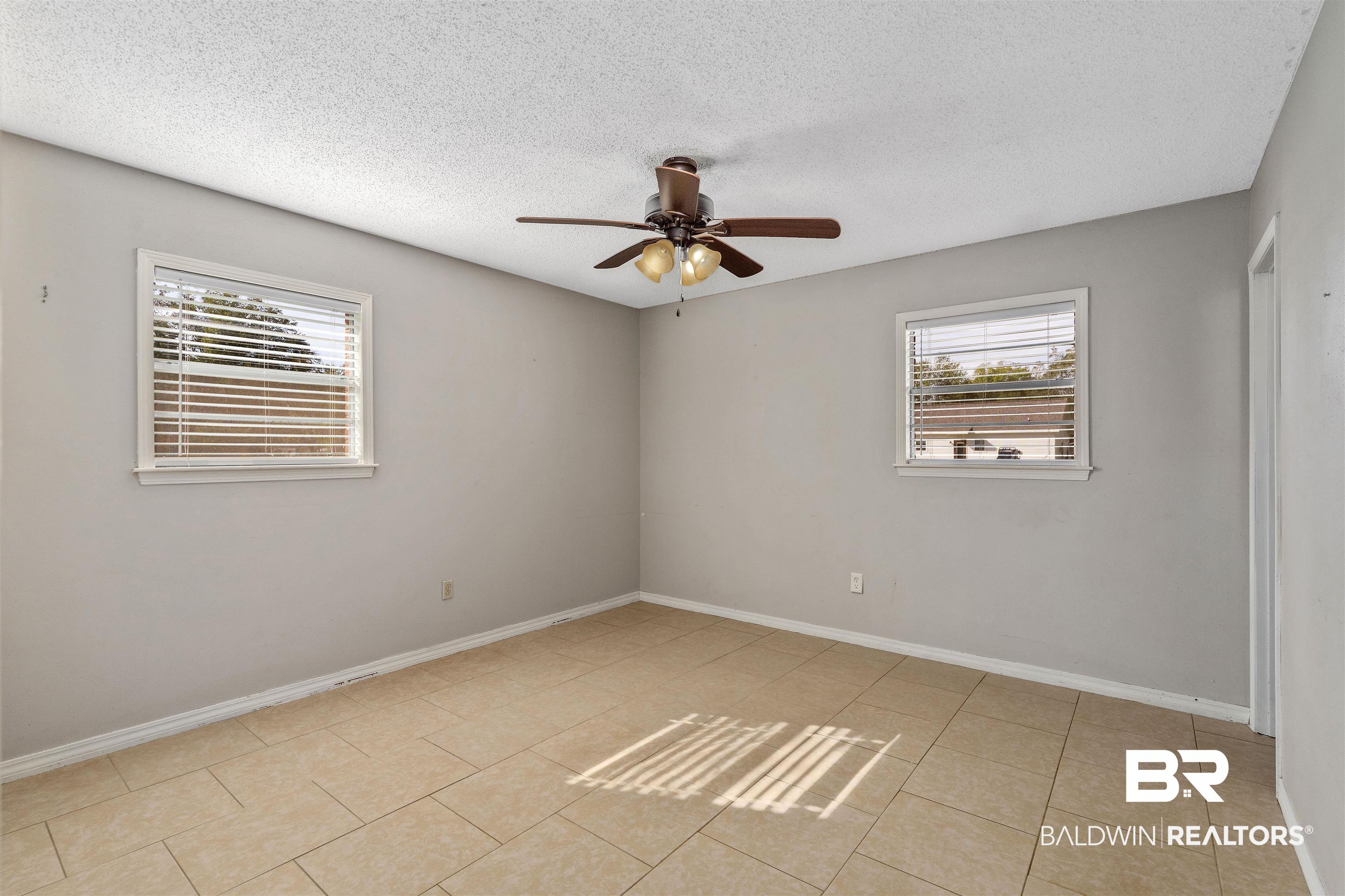 207 Northeast 3rd Street Summerdale, AL 36580 - Photo 10 of 33 Primary Bedroom