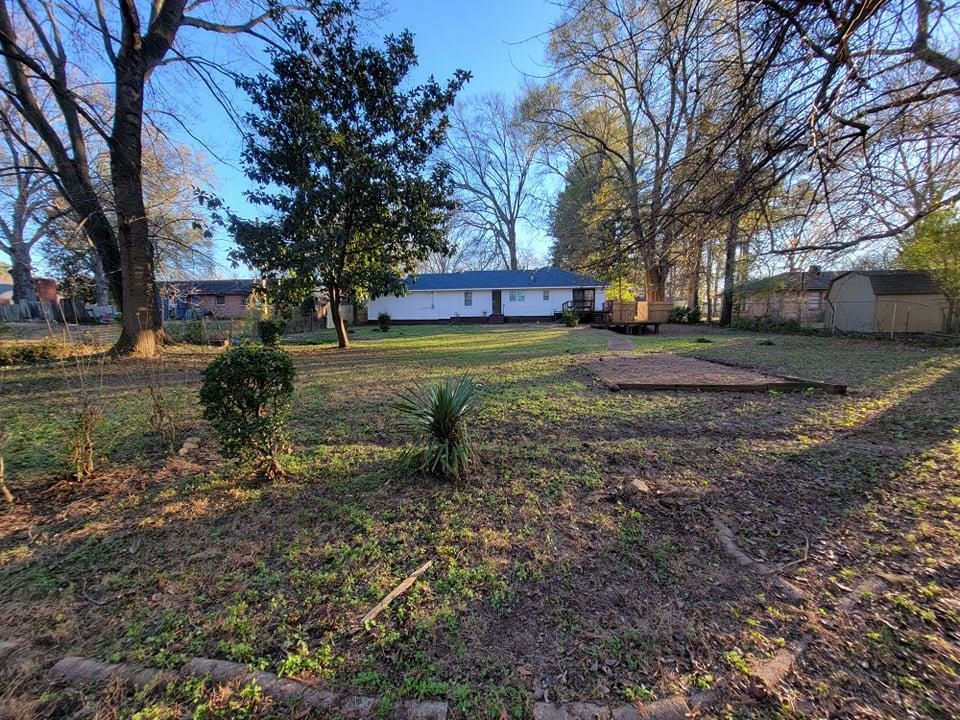 924 Linwood Road Memphis, TN 38116 - Photo 22 of 24 a view of a yard with a tree
