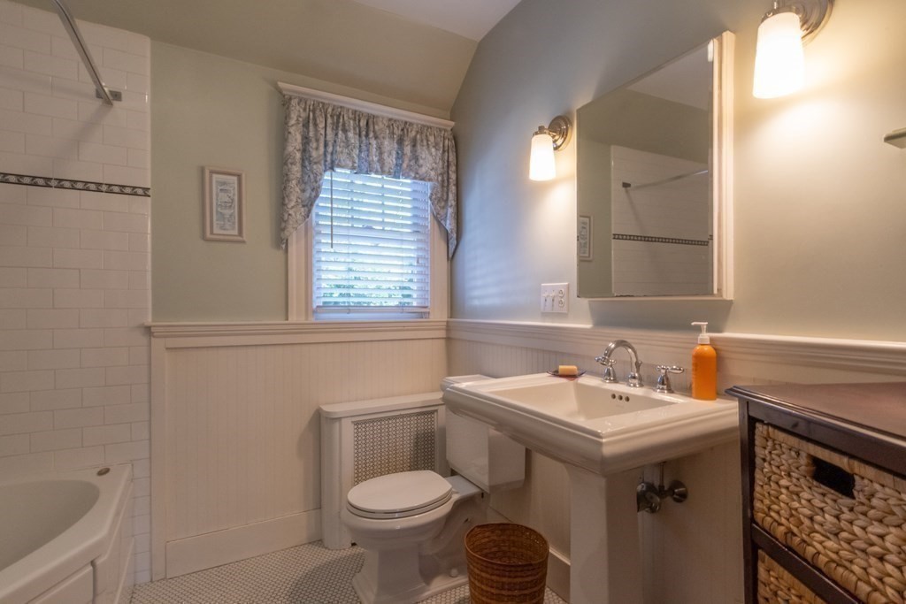 182 Marked Tree Road Needham, MA 02492 - Photo 18 of 21 a bathroom with a sink and a toilet