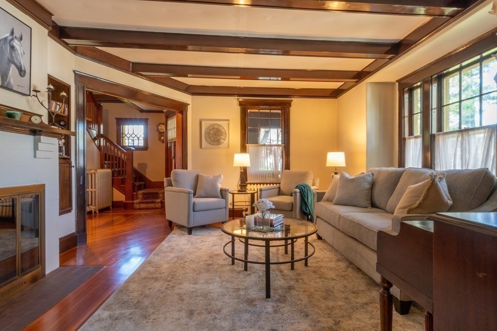 182 Marked Tree Road Needham, MA 02492 - Photo 5 of 21 a living room with furniture and a fireplace