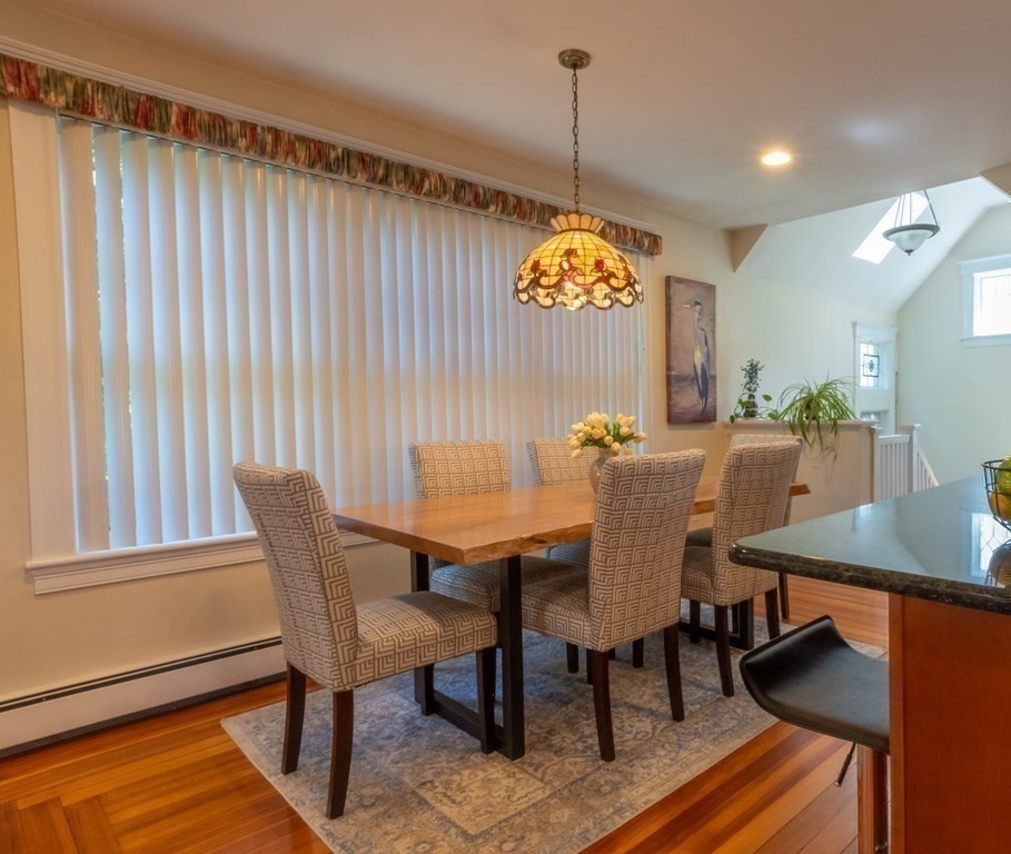 182 Marked Tree Road Needham, MA 02492 - Photo 8 of 21 a view of a dining room with furniture window and wooden floor