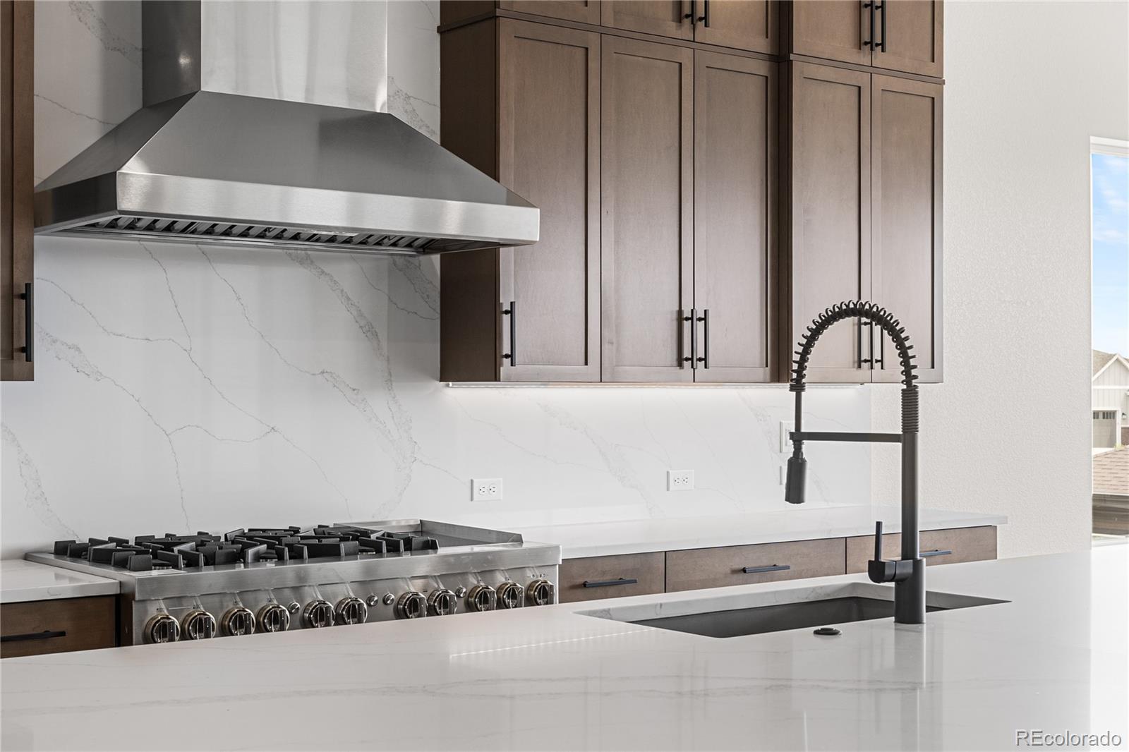 7392 Timberstone Street Castle Pines, CO 80108 - Photo 12 of 42 a room with a stove