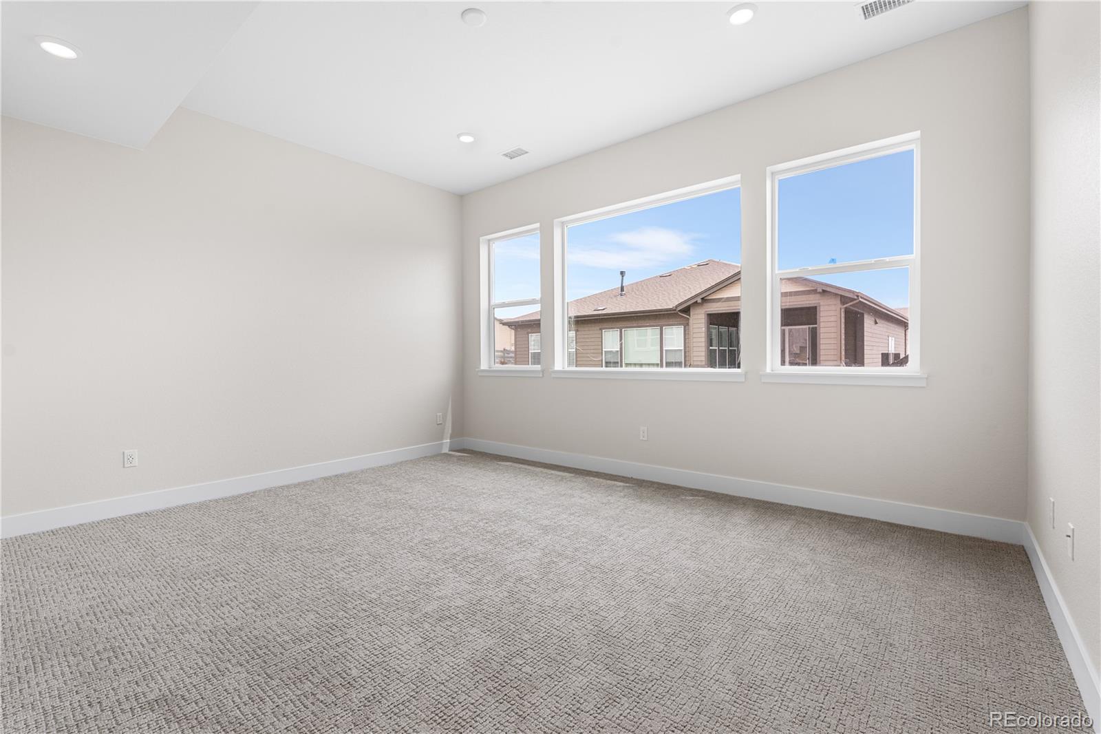 7392 Timberstone Street Castle Pines, CO 80108 - Photo 16 of 42 an empty room with a window