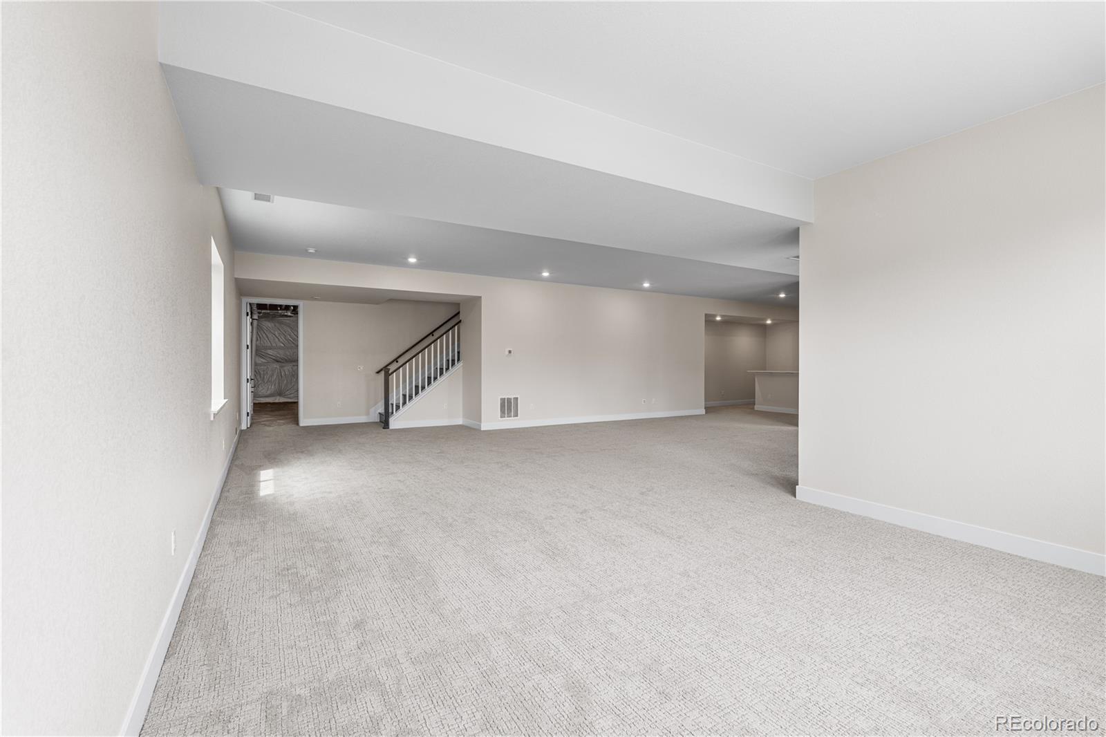 7392 Timberstone Street Castle Pines, CO 80108 - Photo 25 of 42 an empty room with a natural light