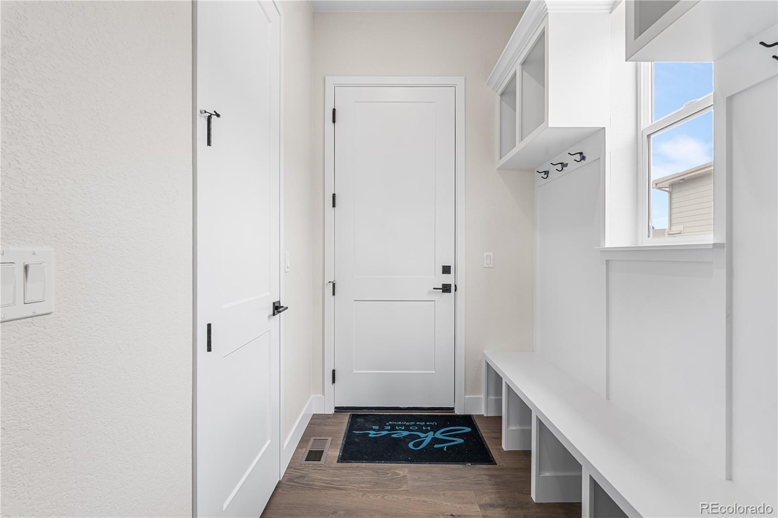 7392 Timberstone Street Castle Pines, CO 80108 - Photo 32 of 42 a view of room with window and hardwood