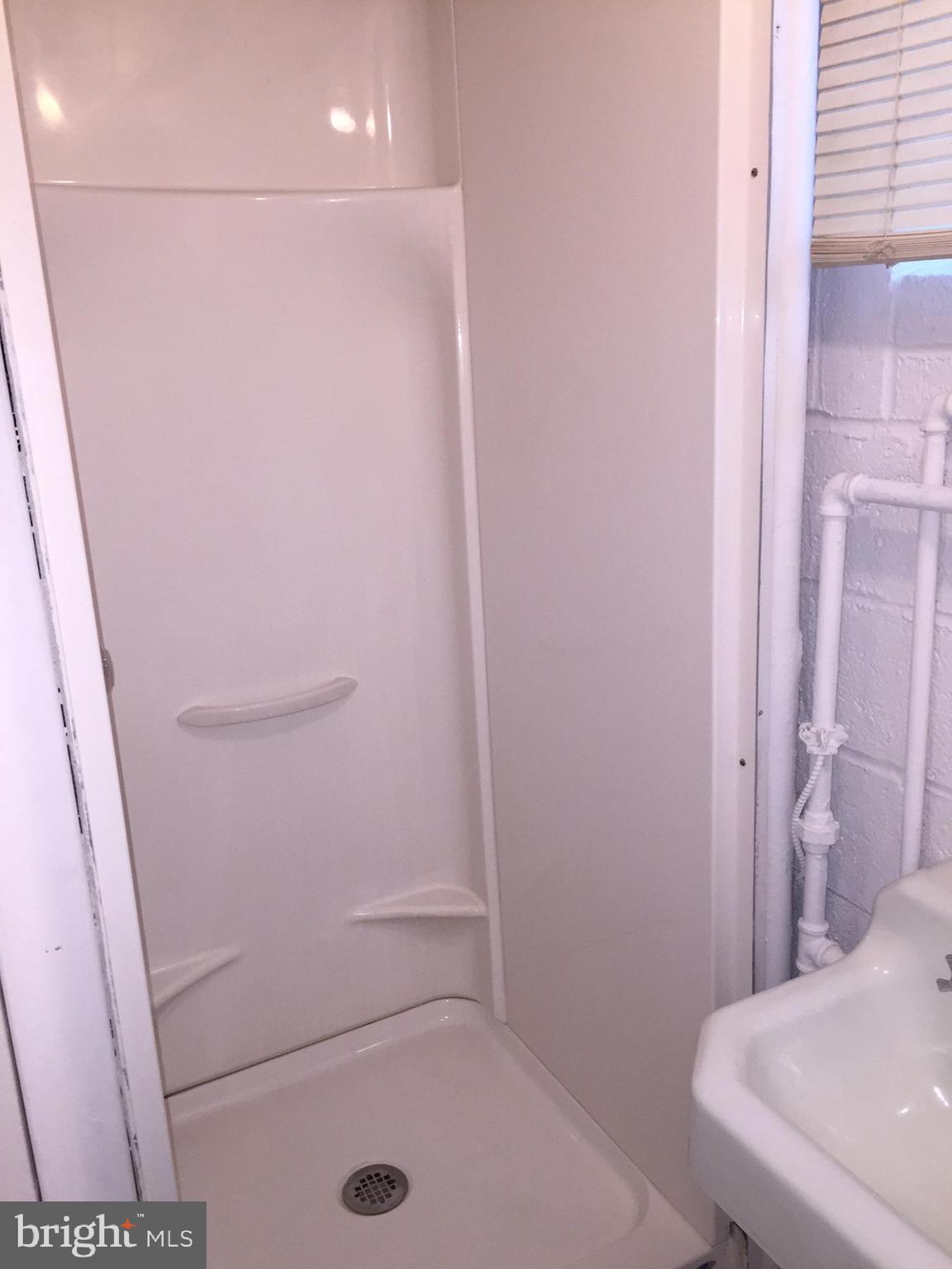 5354 Pooks Hill Road, Unit 302 Bethesda, MD 20814 - Photo 17 of 20 Shower in lower level Bath