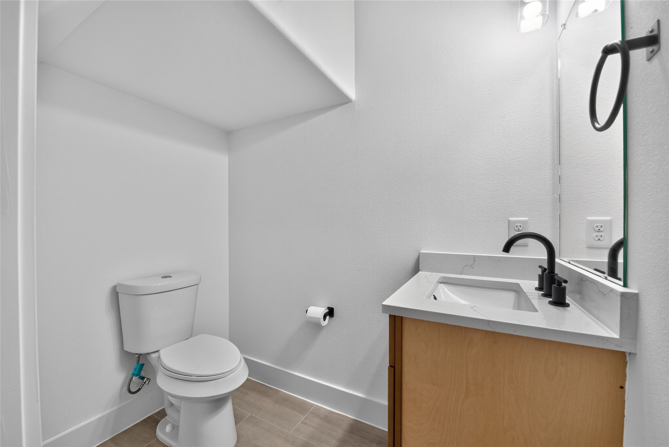 3537 Amos Street Houston, TX 77021 - Photo 17 of 32 A generously sized half bath on the main floor, thoughtfully designed for everyday convenience and visiting guests.