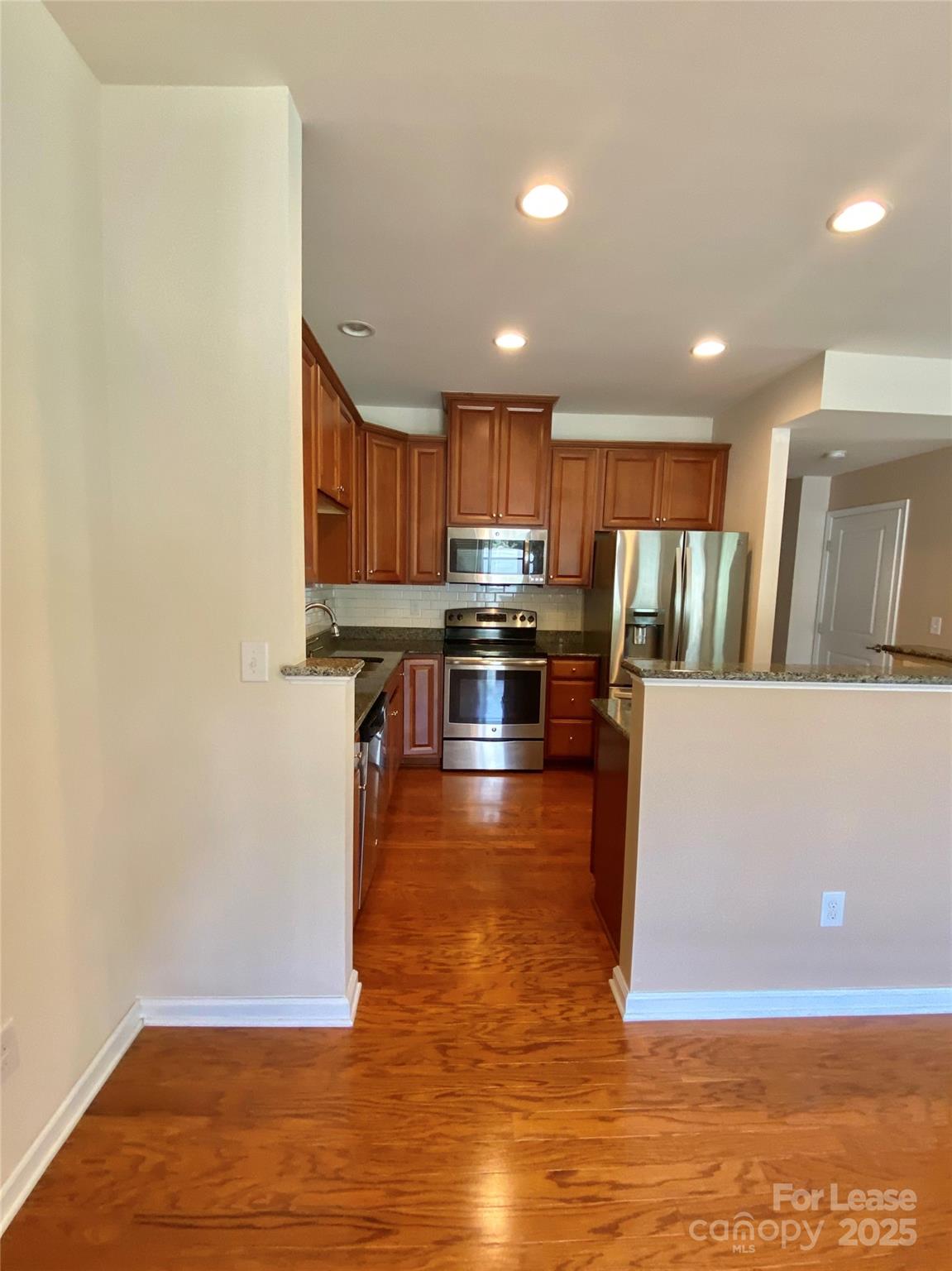 2601 Silverthorn Drive Charlotte, NC 28273 - Photo 12 of 36 a view of kitchen with wooden floor
