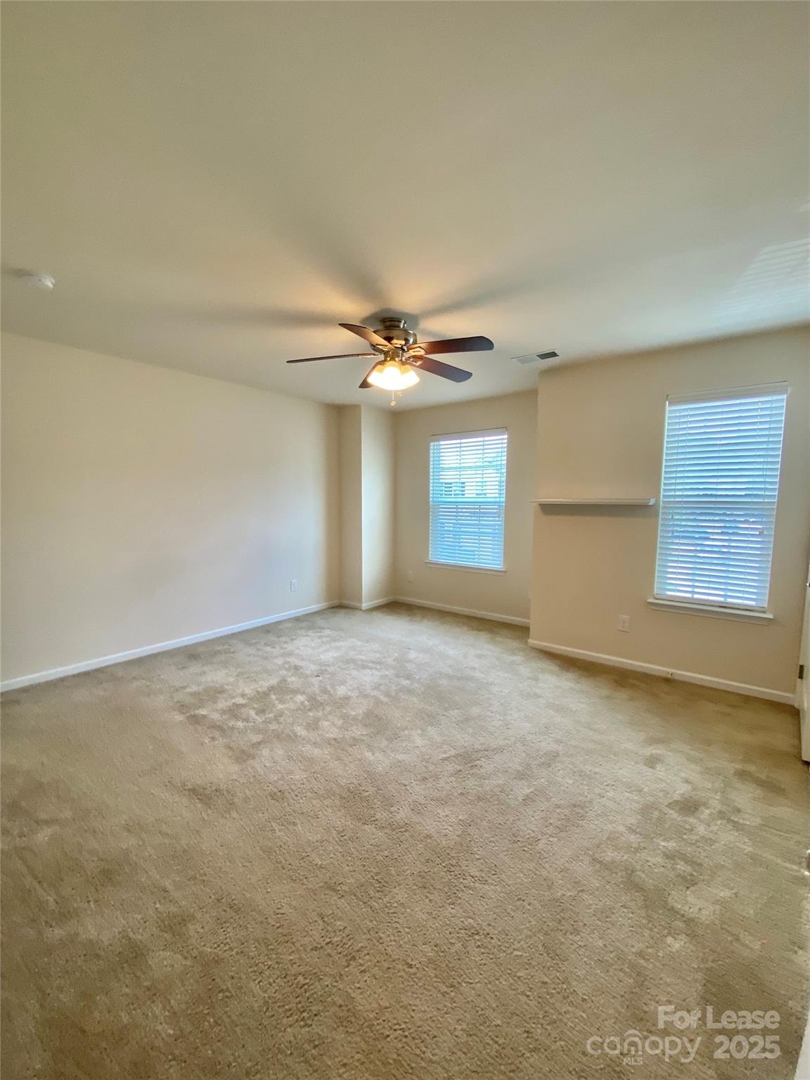 2601 Silverthorn Drive Charlotte, NC 28273 - Photo 19 of 36 a view of an empty room with a window