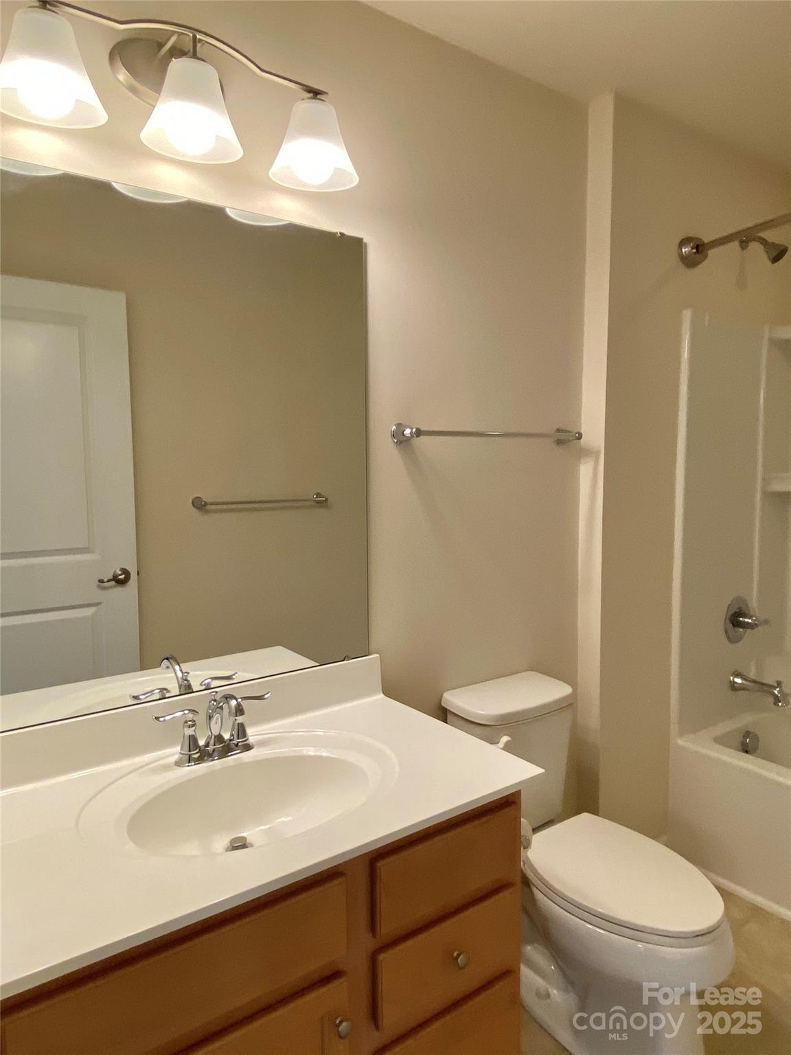 2601 Silverthorn Drive Charlotte, NC 28273 - Photo 29 of 36 a bathroom with a sink a toilet and shower