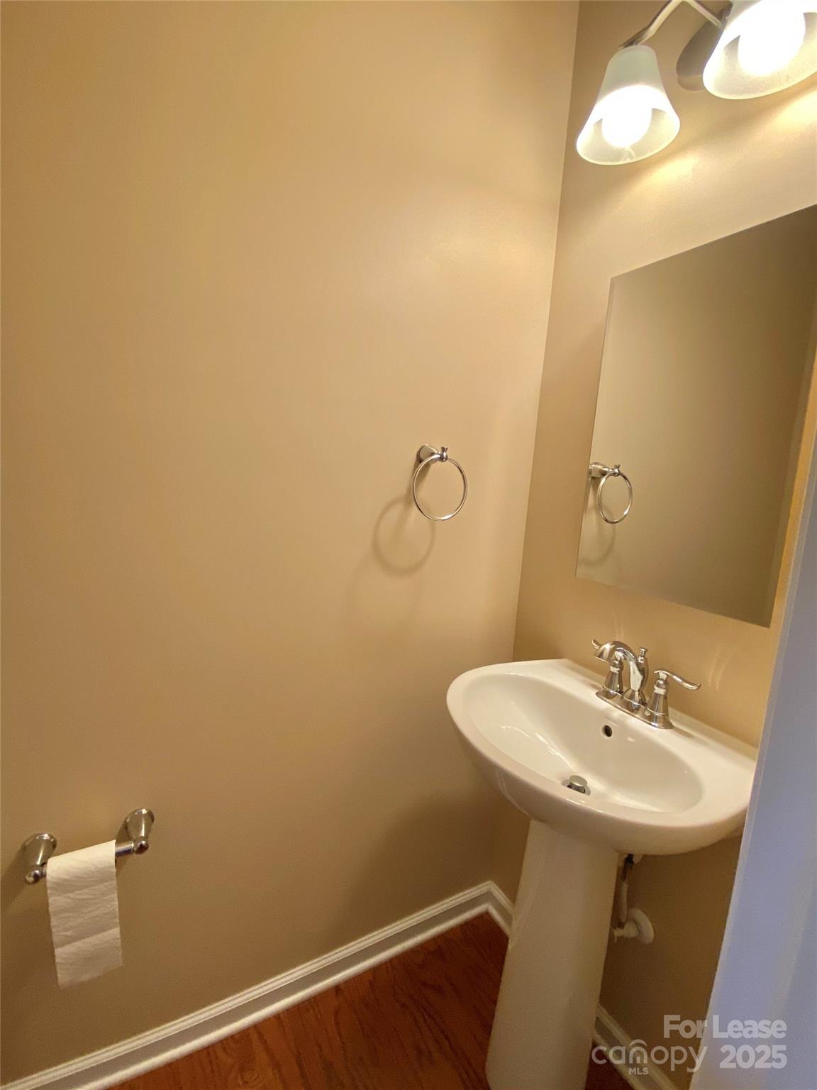 2601 Silverthorn Drive Charlotte, NC 28273 - Photo 3 of 36 a bathroom with a sink mirror and vanity