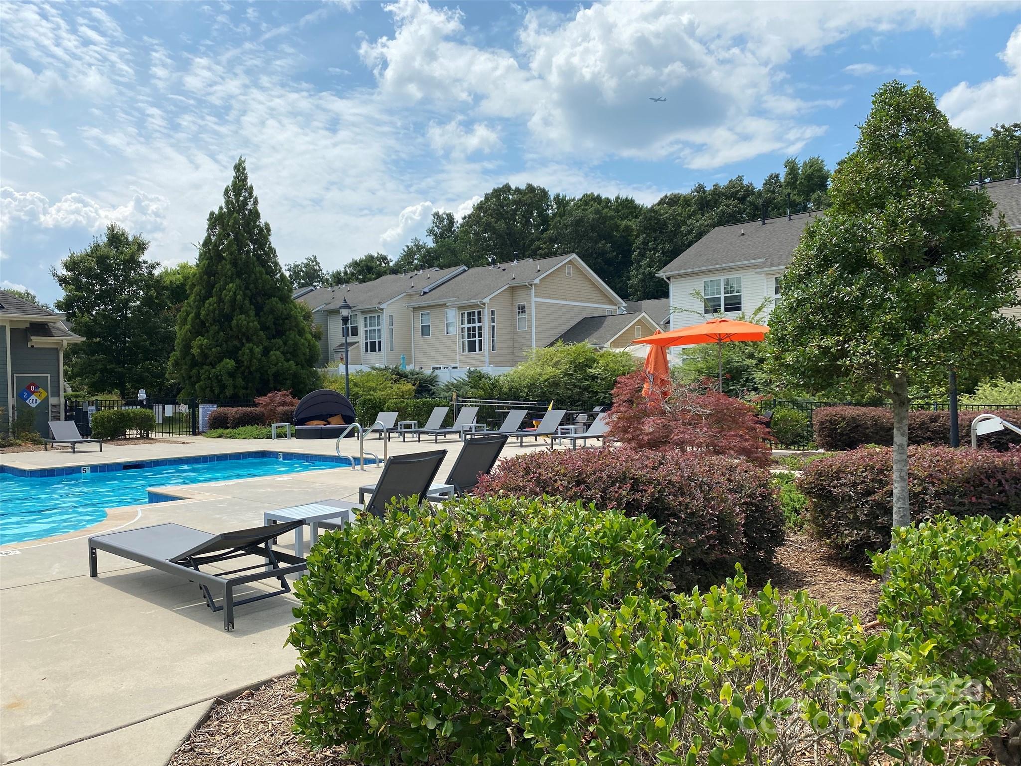 2601 Silverthorn Drive Charlotte, NC 28273 - Photo 35 of 36 a view of a house with swimming pool and sitting area