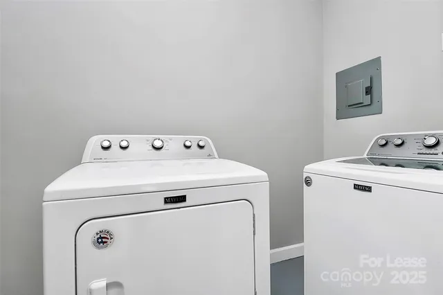 a utility room with dryer and washer