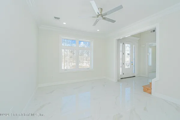 a view of a kitchen with a sink and dishwasher a refrigerator with wooden floor