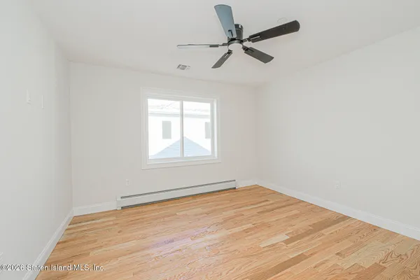 a bathroom with a bathtub and a sink