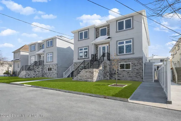a view of a house with a swimming pool