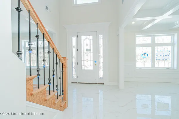 a view of an entryway with staircase