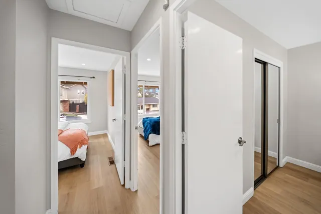 a view of a patio with table and chairs and potted plants
