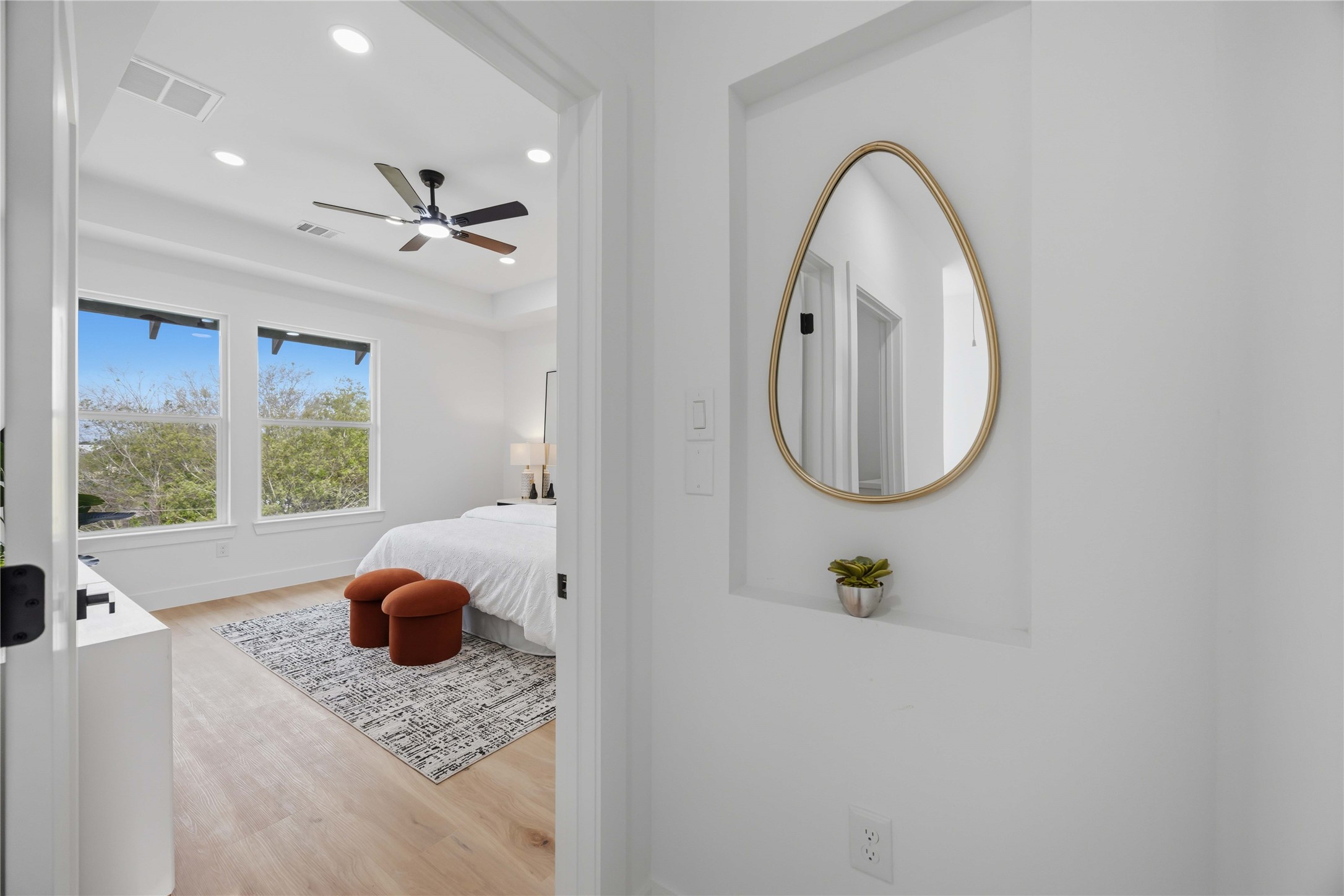 2014 Yates Street Houston, TX 77020 - Photo 27 of 45 a bathroom with a granite countertop sink a mirror and shower