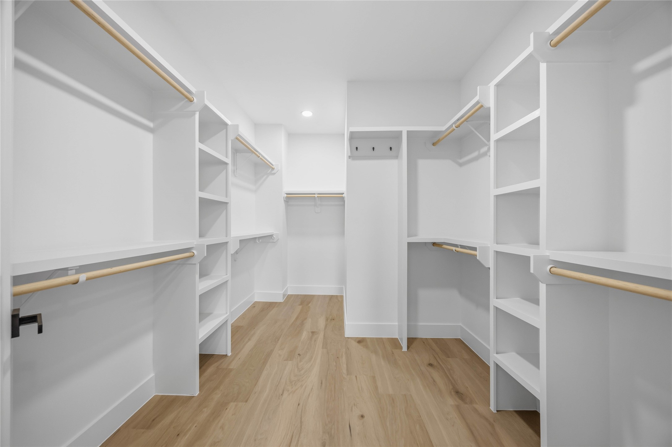 2014 Yates Street Houston, TX 77020 - Photo 38 of 45 a view of walk in closet with empty racks