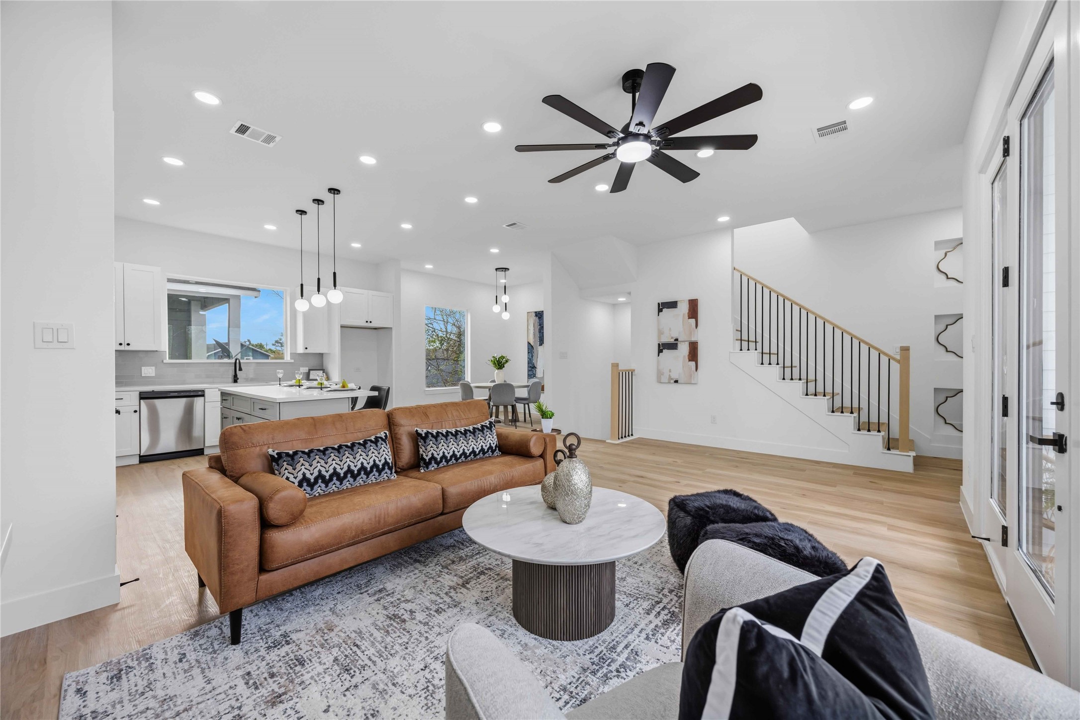 2014 Yates Street Houston, TX 77020 - Photo 10 of 45 a living room with furniture and a view of kitchen
