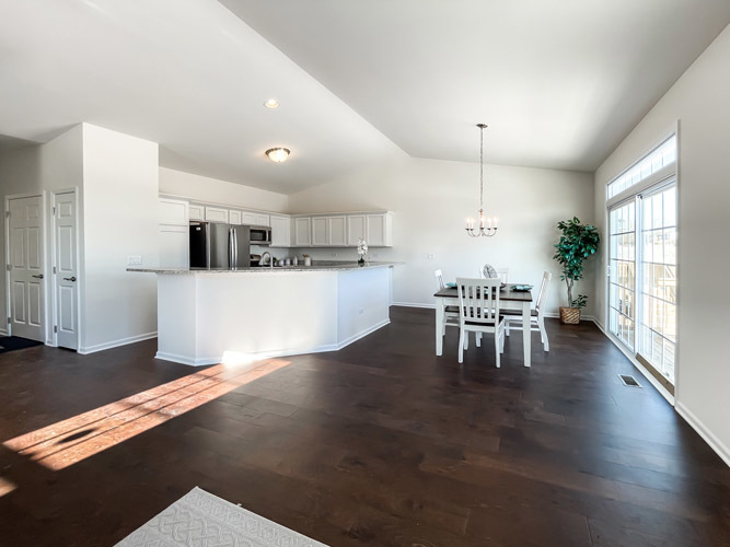 455 Ridge Lane Bolingbrook, IL 60440 - Photo 4 of 14 a kitchen with furniture and wooden floor